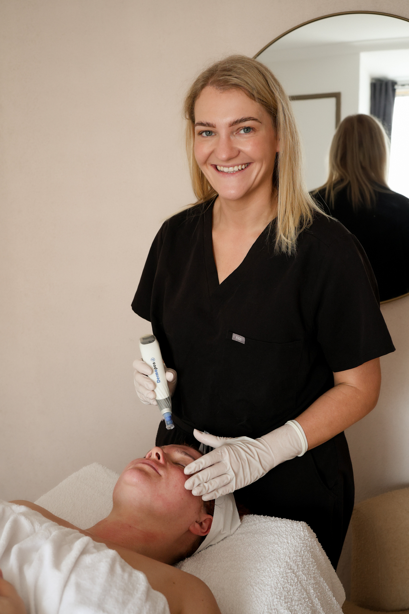 Home Skin therapist Charlotte performing an advanced Dermapen skin treatment in Joondalup.